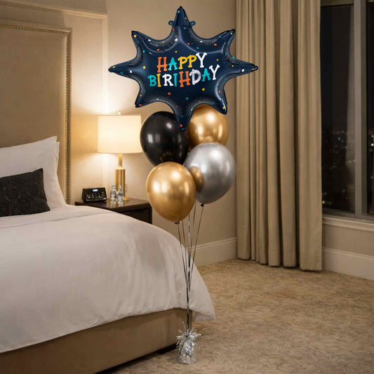 Birthday balloons with a 'Happy Birthday' balloon in a bedroom setting.