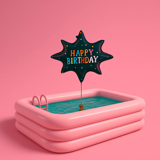 Pink inflatable pool with a 'Happy Birthday' balloon on a pink background