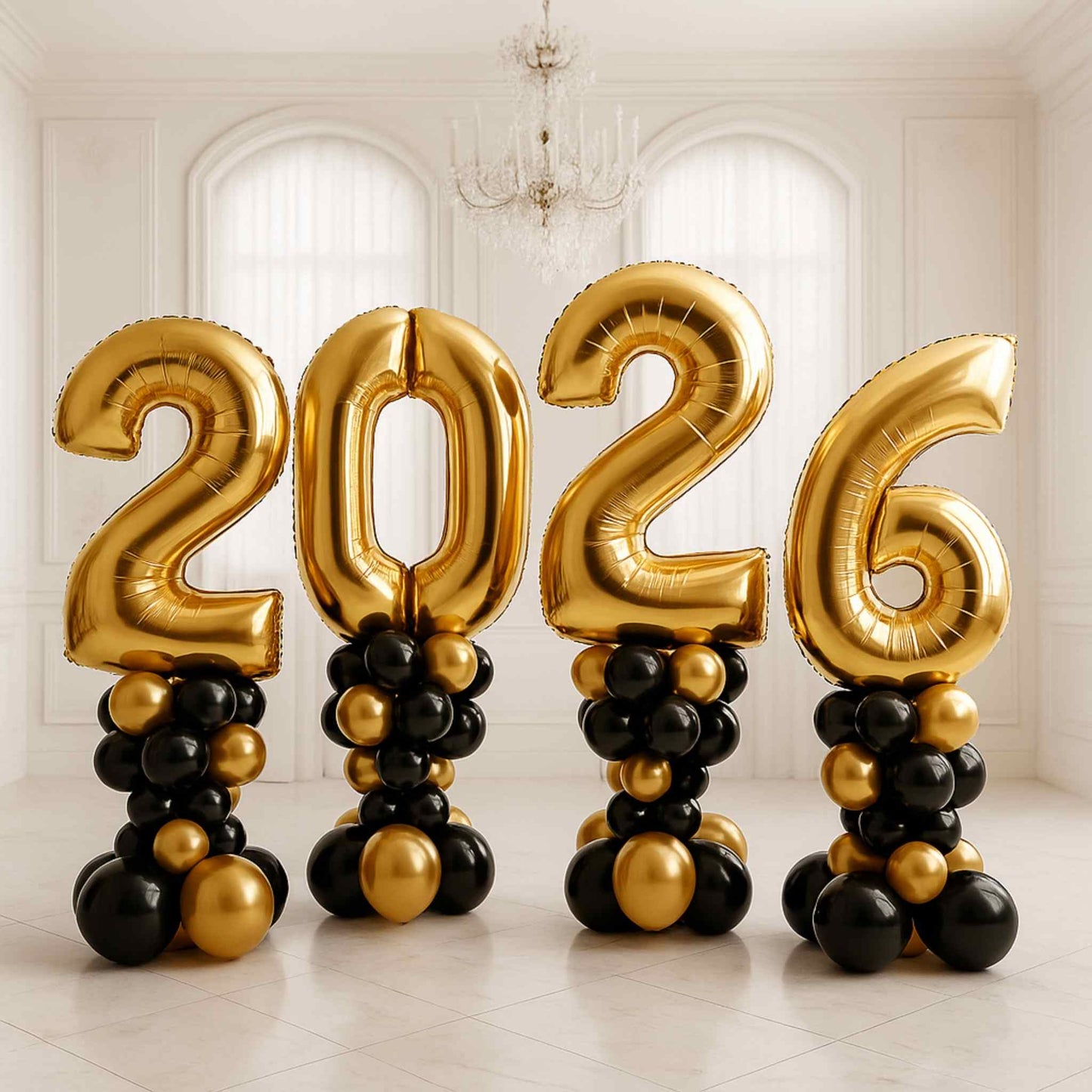 Gold and black balloon numbers '2026' in a decorative setting.