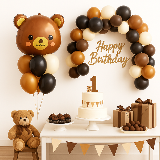 Birthday party setup with teddy bear balloons, cake, and presents on a table.