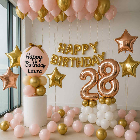 Birthday celebration setup with balloons and 'Happy Birthday Laura' sign.