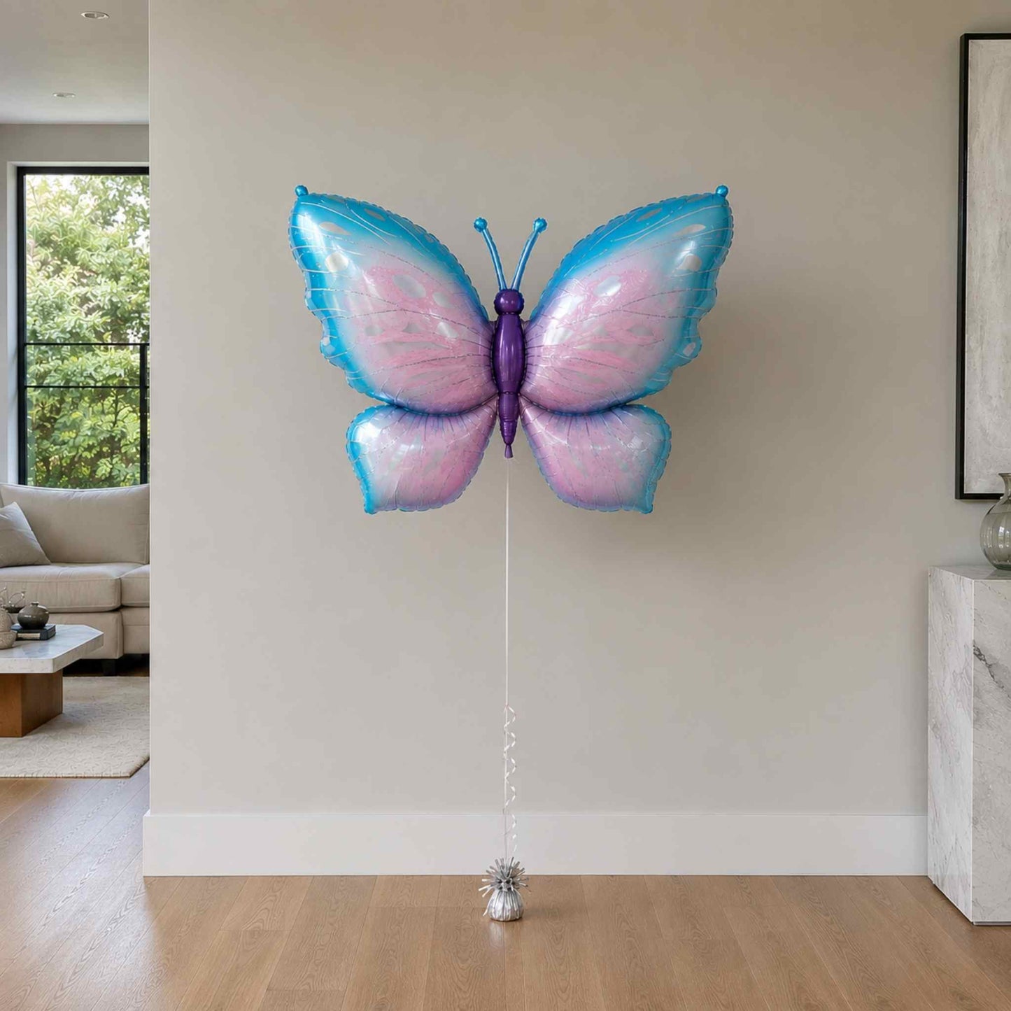 Butterfly-shaped balloon in a living room setting