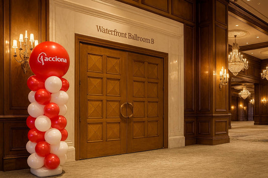 red and white balloon column tower inside a ballroom hotel