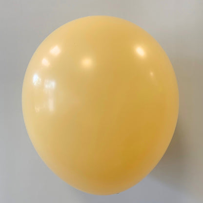 Yellow balloon on a plain background