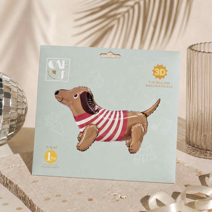 Dog-shaped balloon in a 3D packaging on a decorative surface