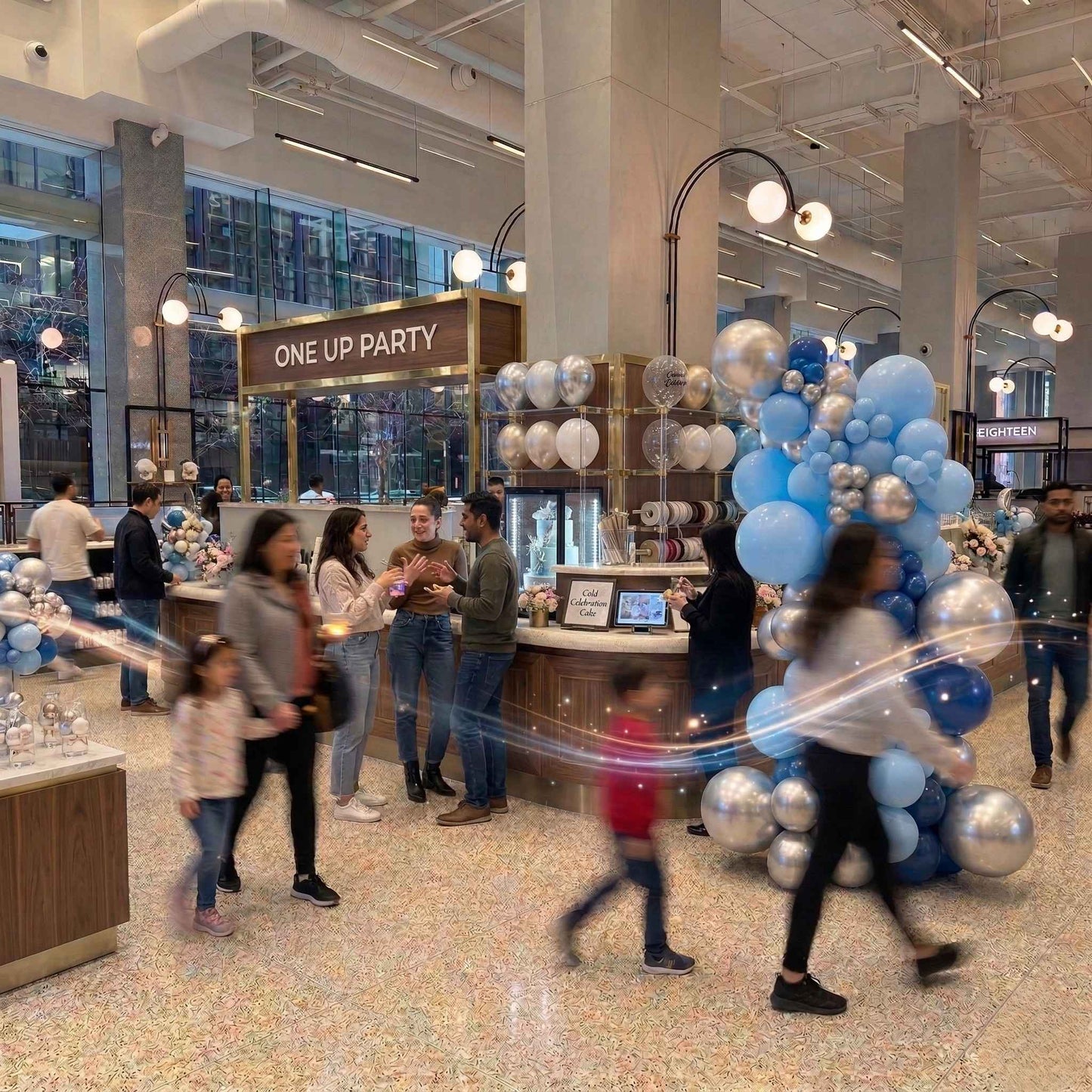 People walking through a modern indoor space with decorative balloons and 'One Up Party' sign.