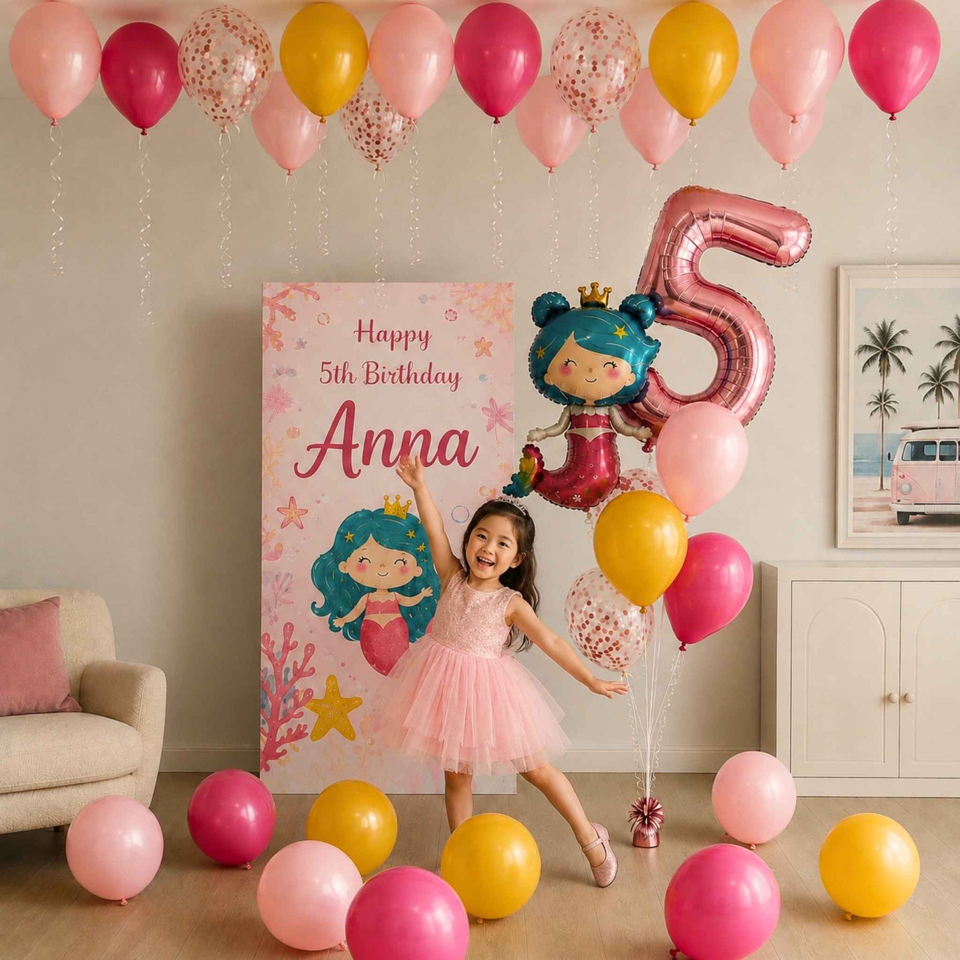 A young girl in a pink tutu stands in a decorated room with pink, yellow, and clear balloons, a large metallic pink '5' balloon, a cartoon mermaid graphic, and a personalized 'Happy 5th Birthday Anna' banner.