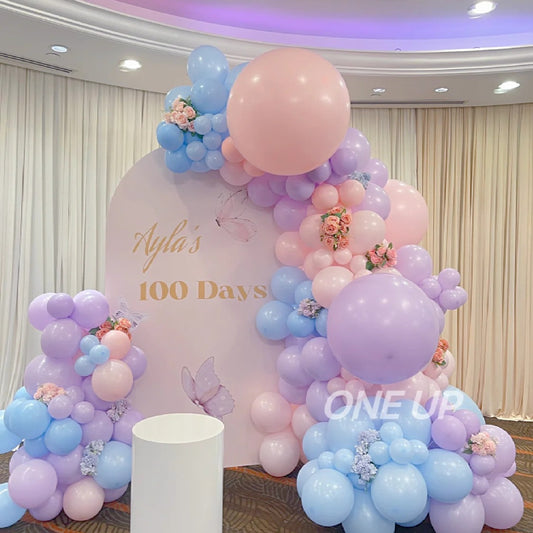 Single custom panel pastel backdrop set with balloons and artificial florals