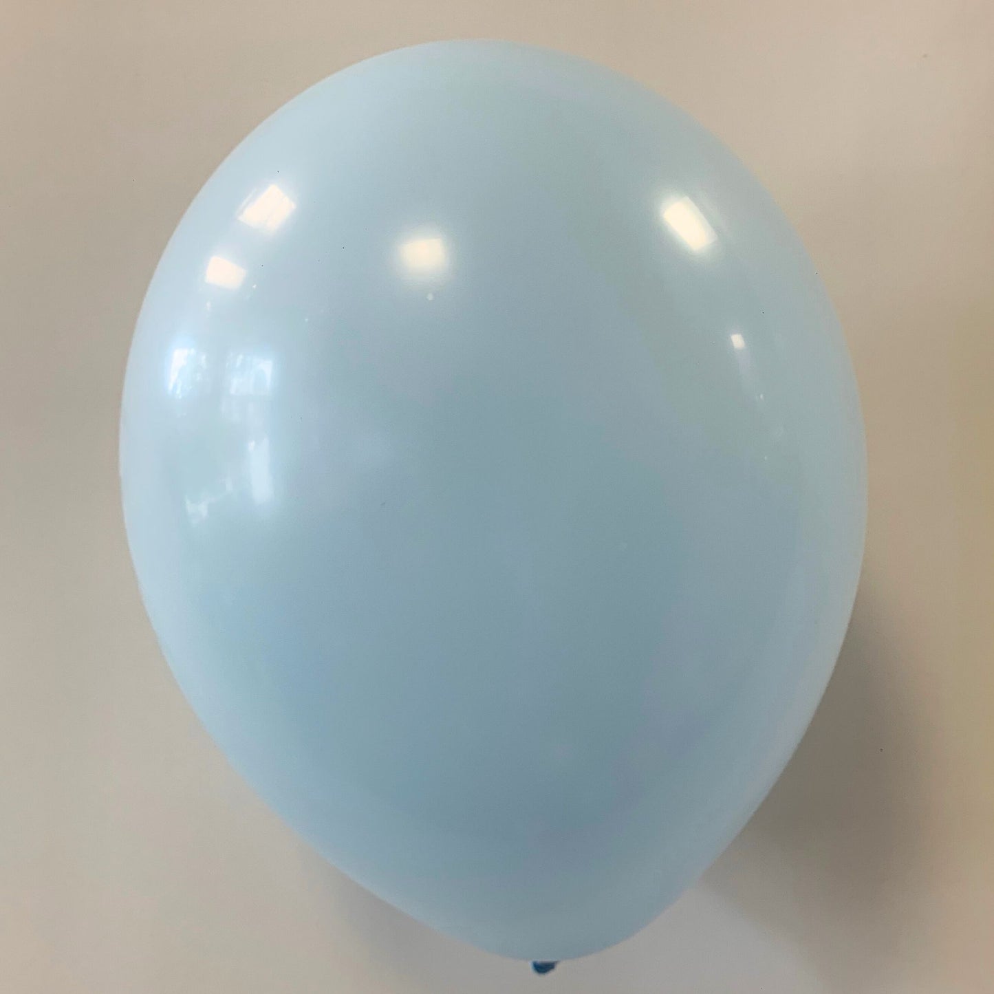 11 inch helium filled Pastel Blue latex balloon