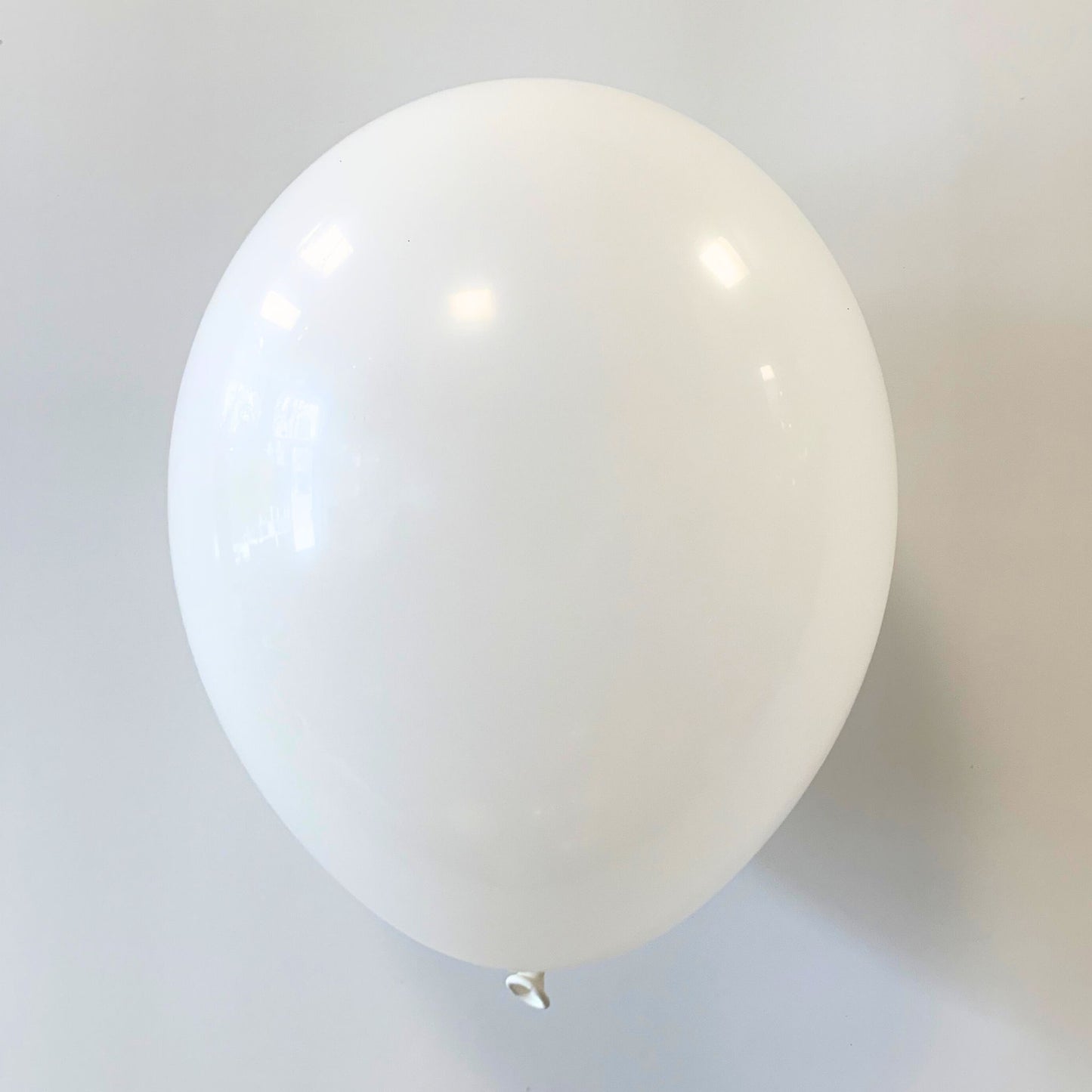 11 inch helium filled White latex balloon