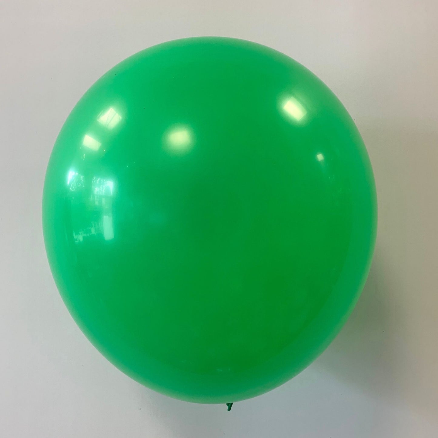11 inch helium filled Green latex balloon