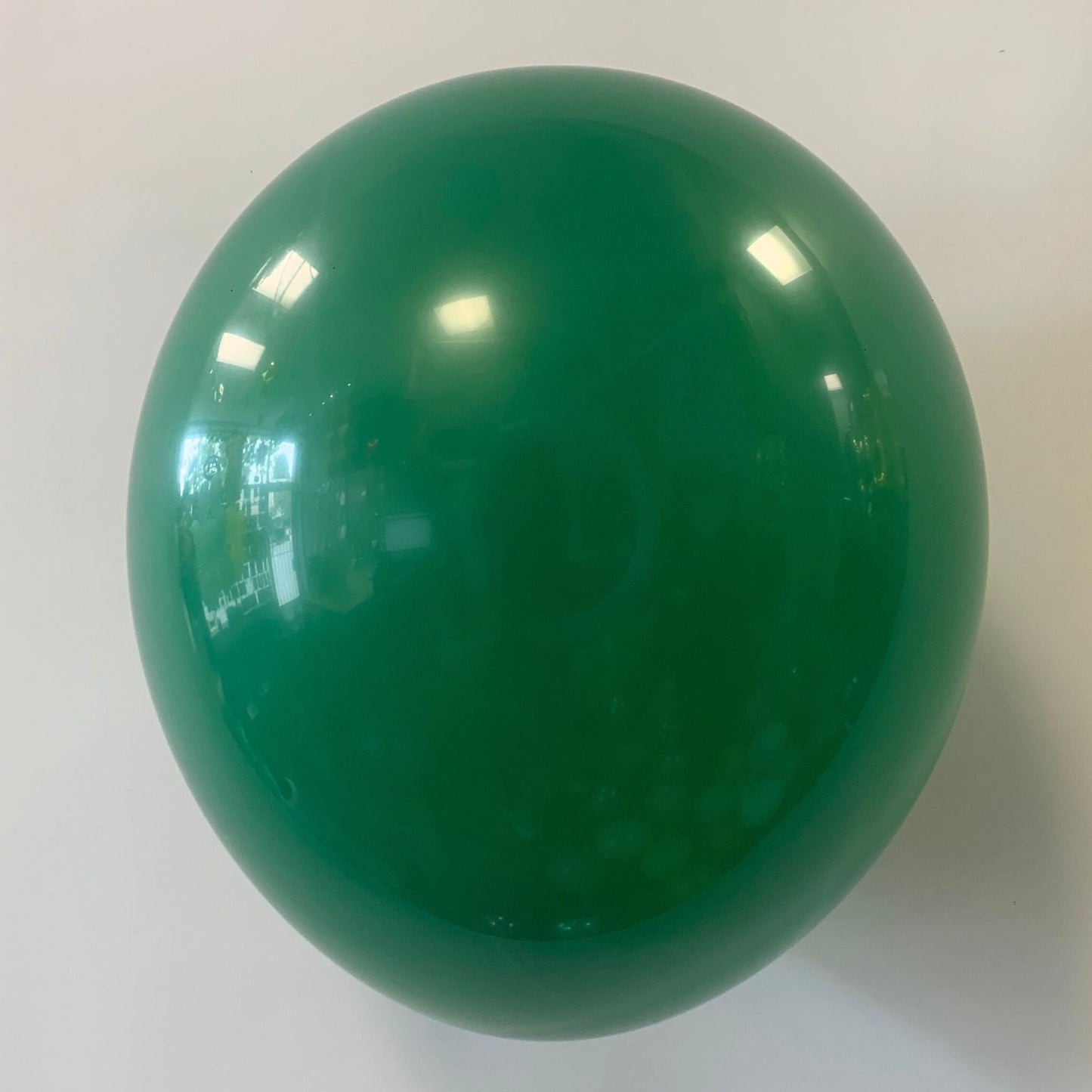 11 inch helium filled Forest Green latex balloon