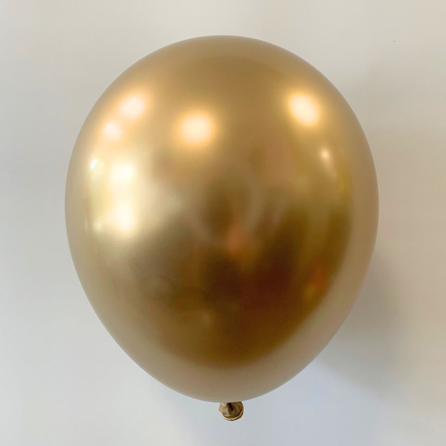 11 inch helium filled Chrome Gold latex balloon