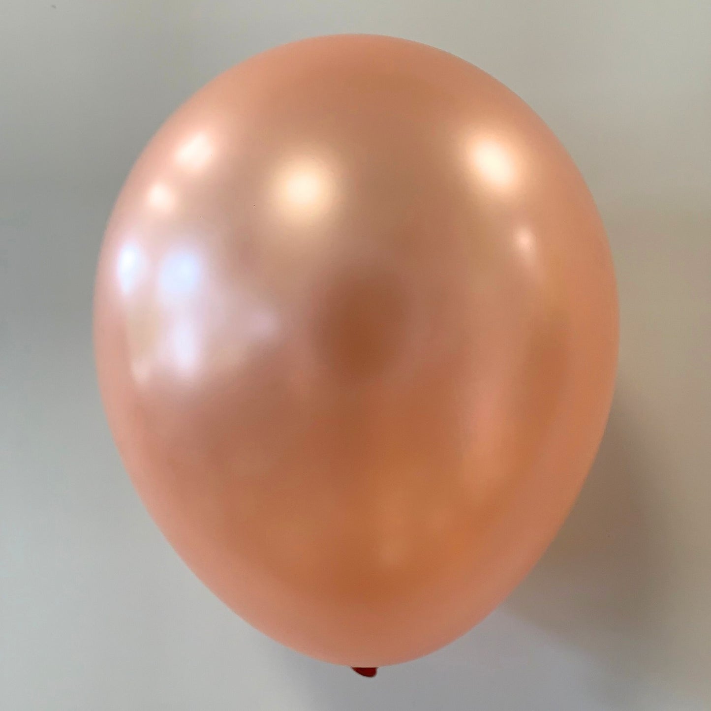 11 inch helium filled Metallic Rose Gold latex balloon