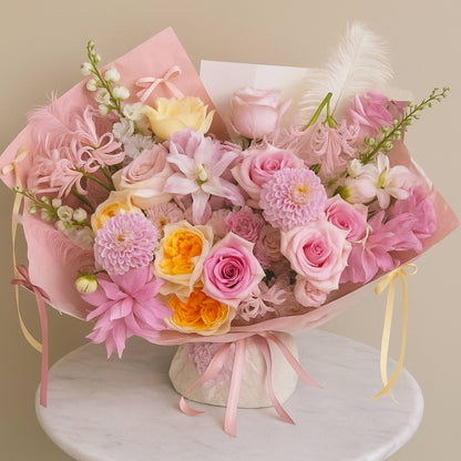 Designer's Choice Pastel Pink & Yellow Super Celebrate Luxury Flower Bouquet