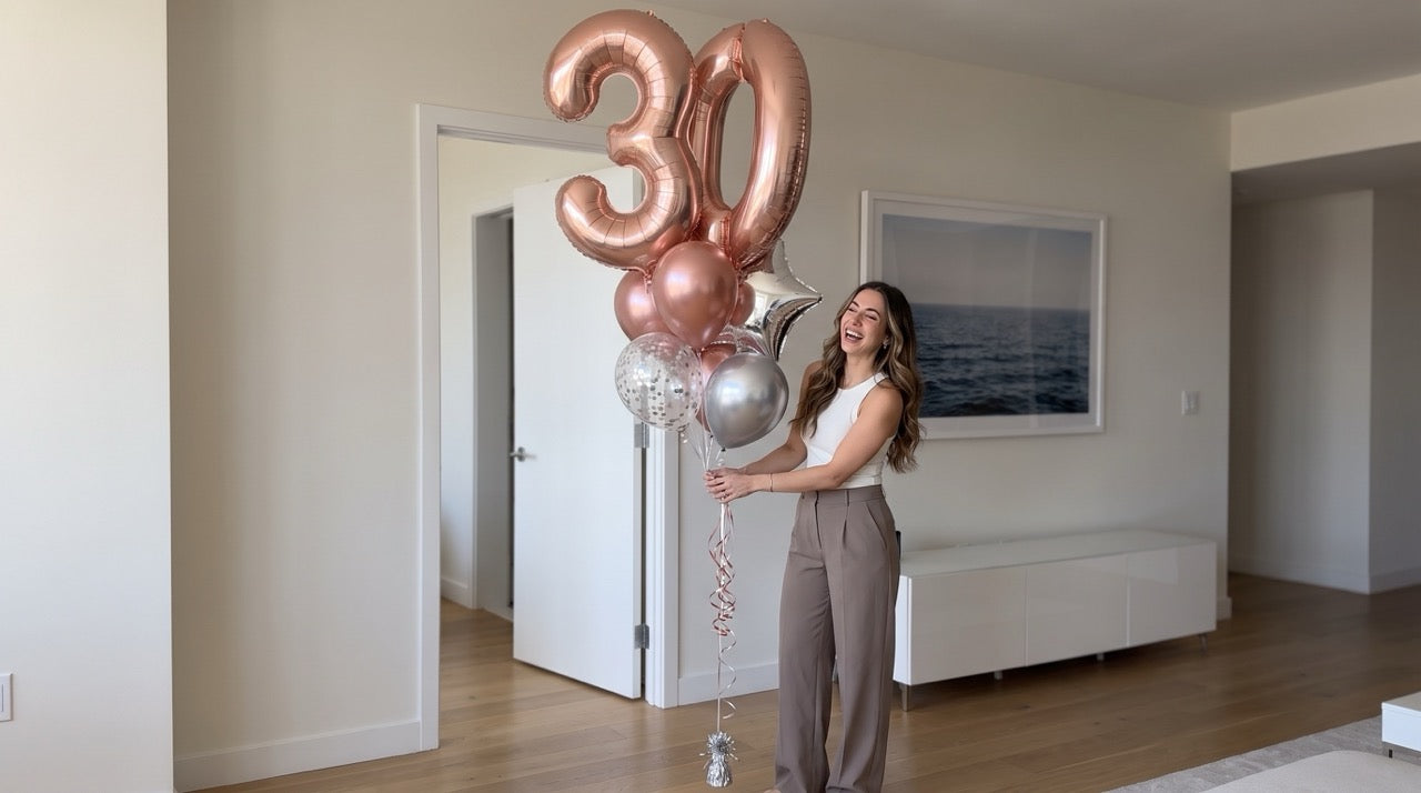 Load video: Video of One Up Balloons delivering luxury balloon bouquets, fresh flowers, and cakes across Canada.