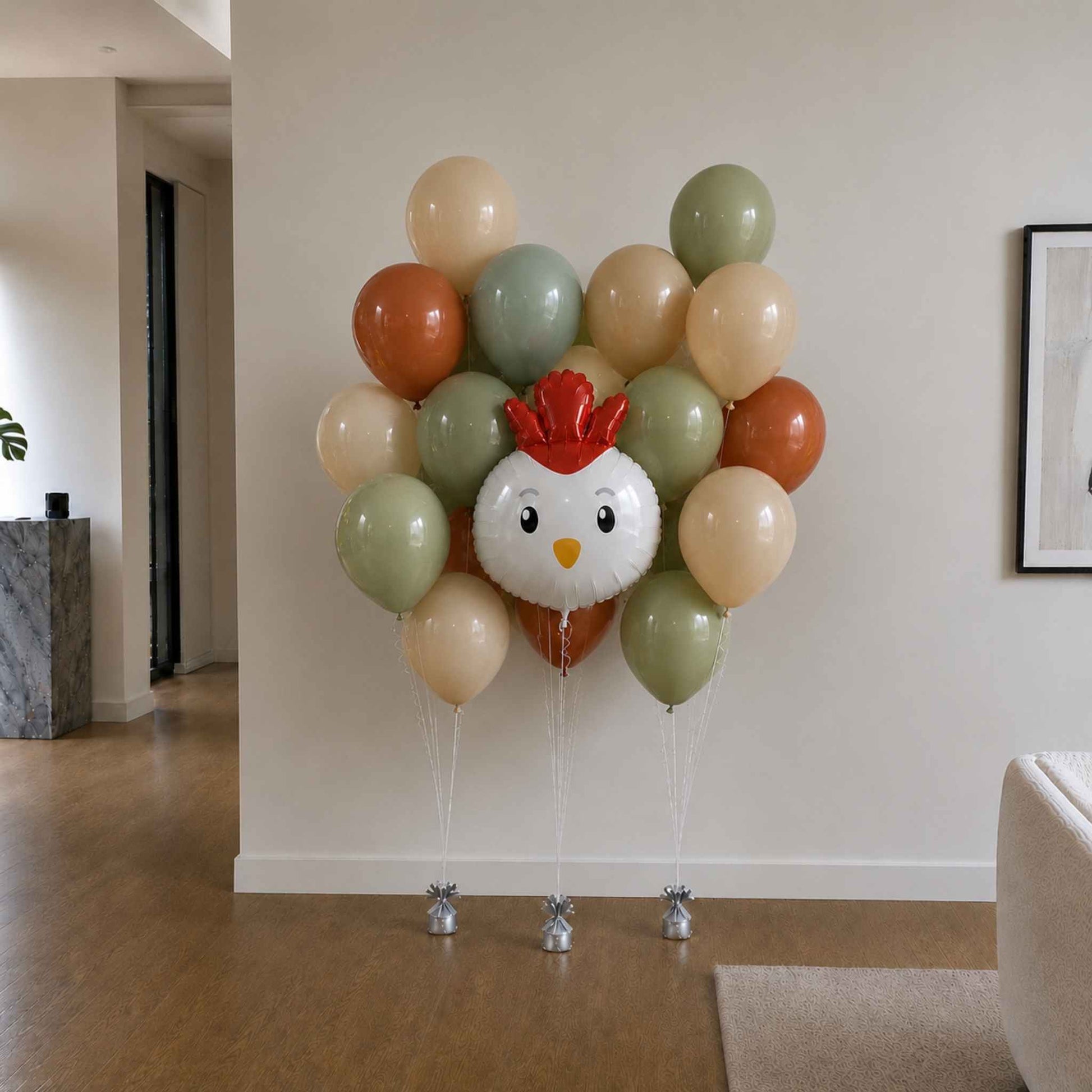 Balloon arrangement shaped like a chicken head in a living room.