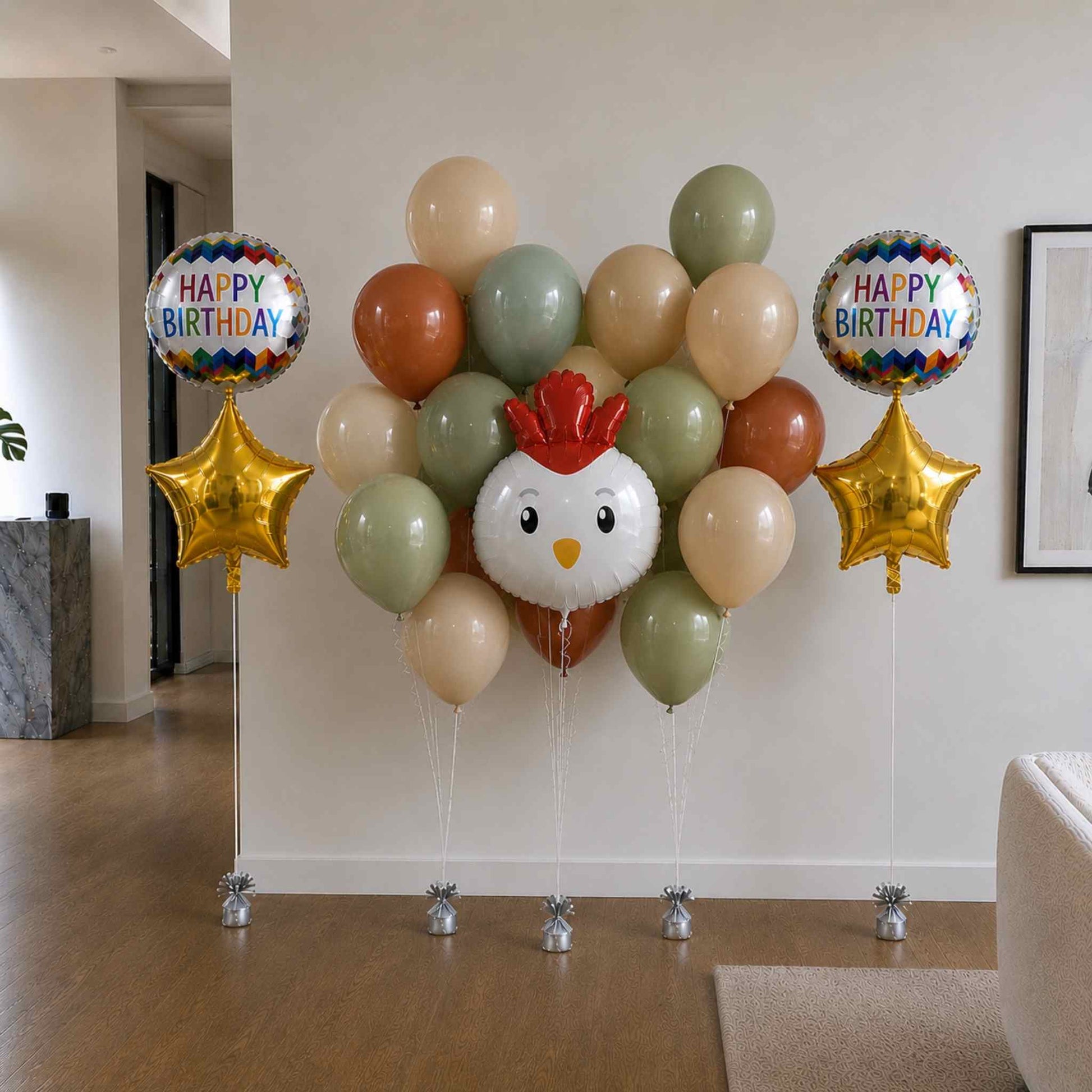 Balloon arrangement with a chicken design and 'Happy Birthday' balloons in a room.