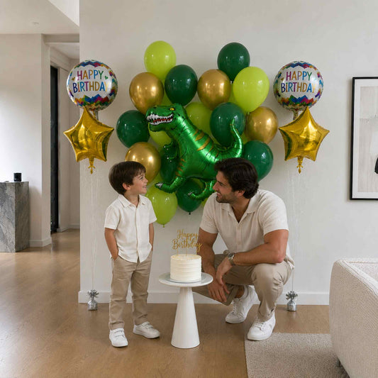 Man and child with birthday cake and balloons in a room