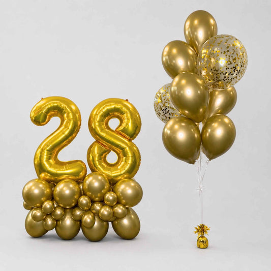 Gold foil balloon decoration set featuring a large '28' balloon number and a bunch of metallic gold and glittery gold balloons on a light gray background.