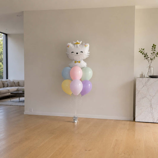 Balloon arrangement with a cat design in a living room setting
