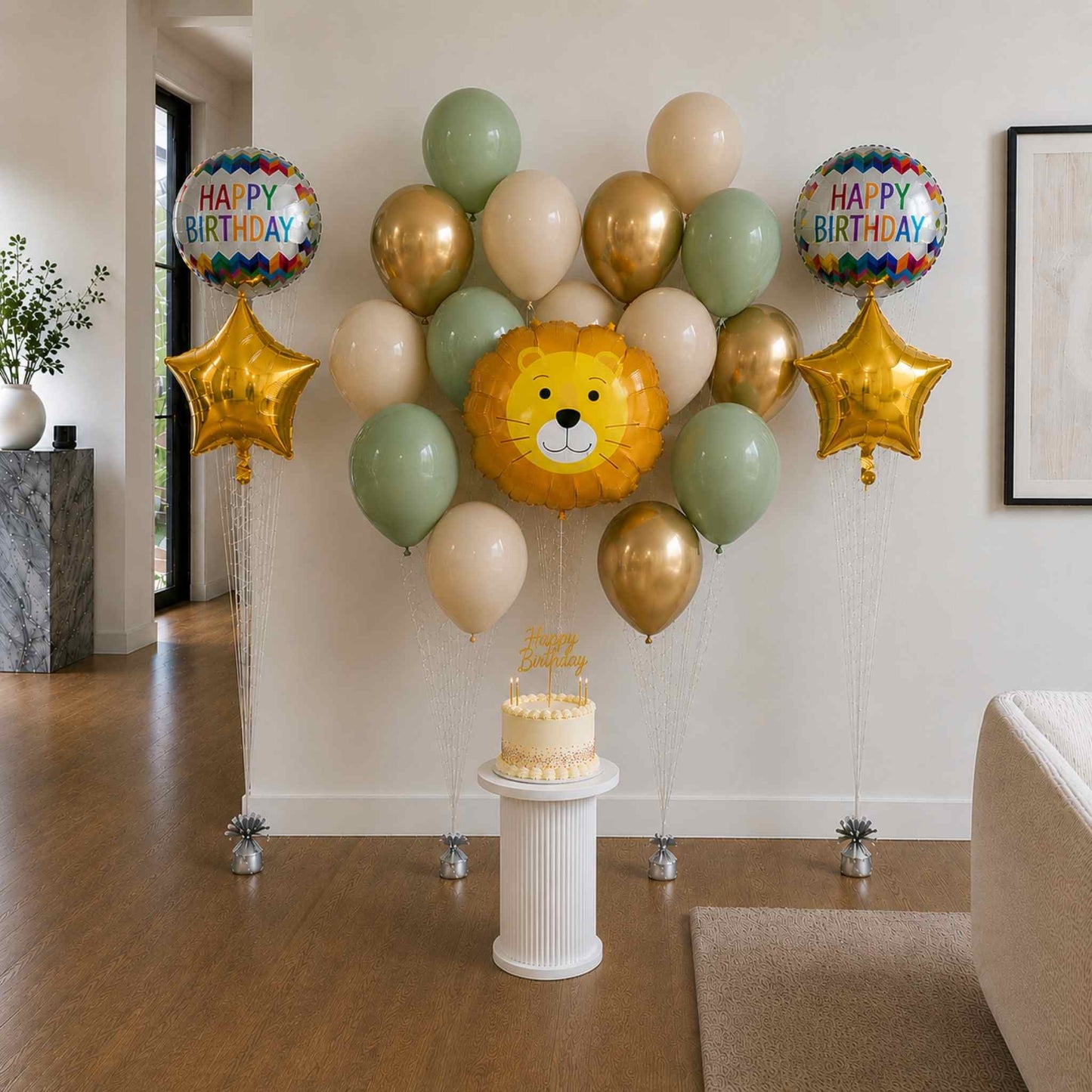 Birthday balloon arrangement with a lion balloon and 'Happy Birthday' balloons in a room.