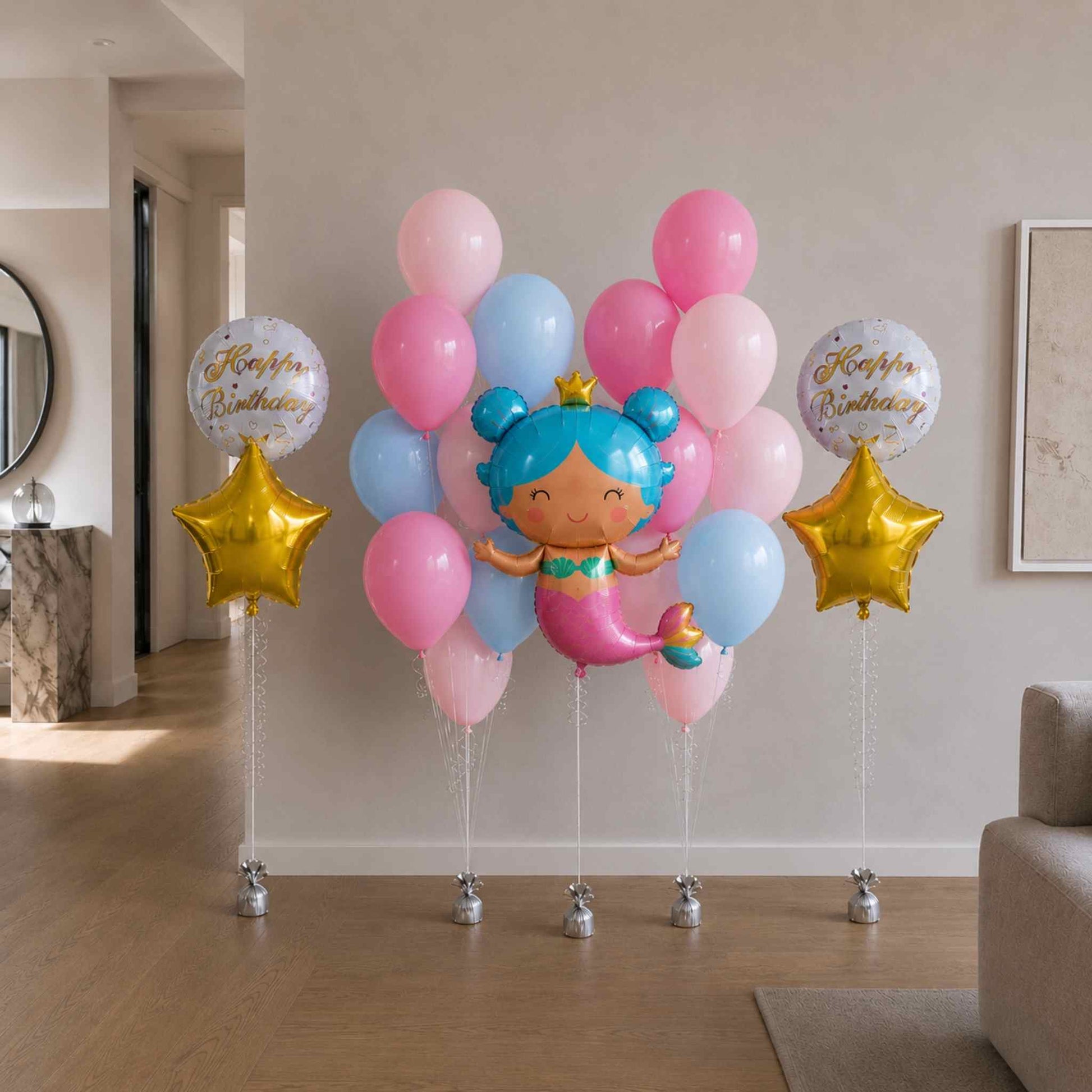 Colorful balloon arrangement with a cartoon character in a living room.