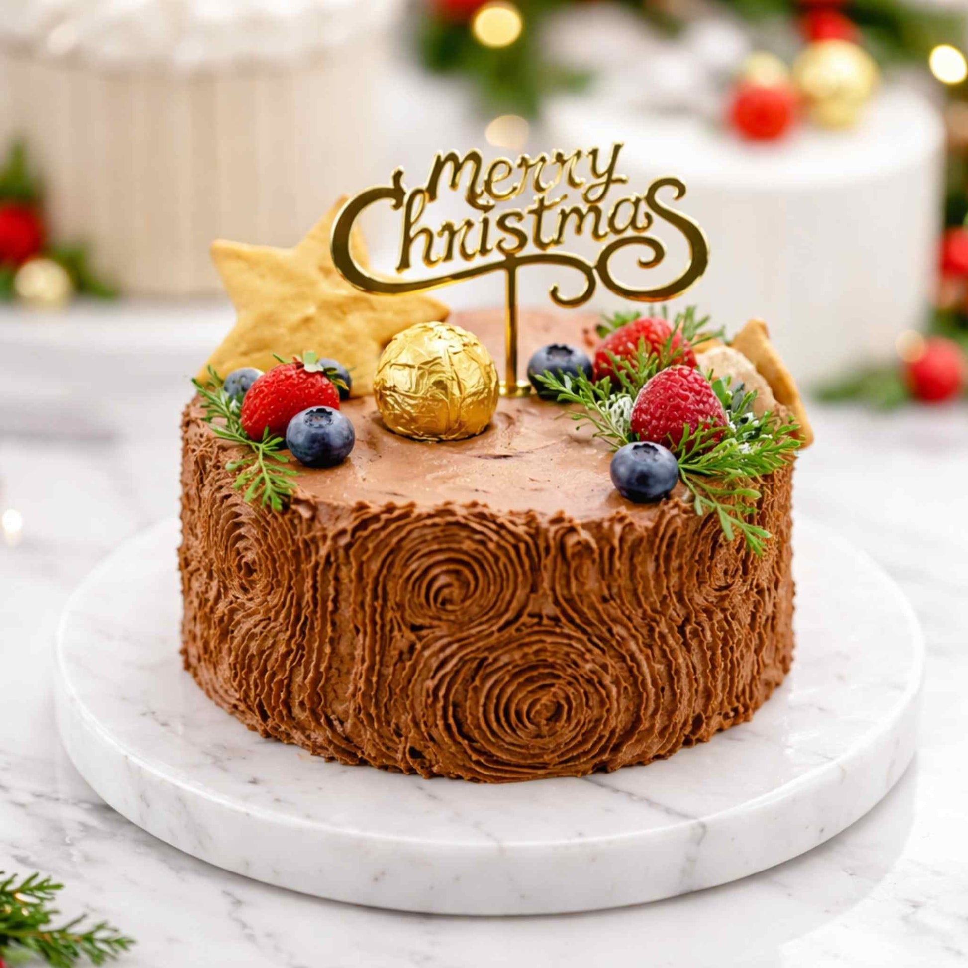 Christmas-themed cake with a 'Merry Christmas' topper on a marble surface.