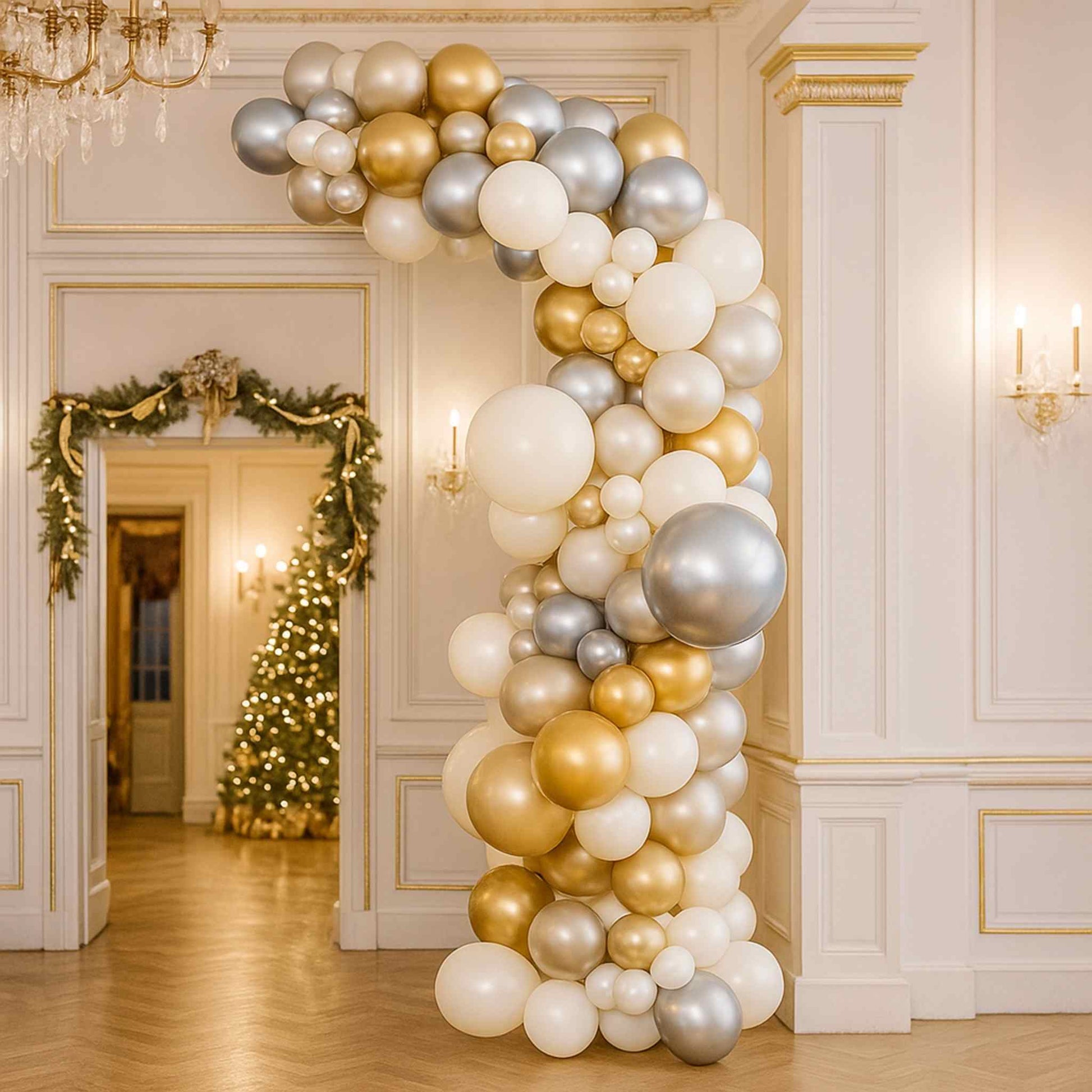 Balloon arch in a decorated room with Christmas tree and garlands