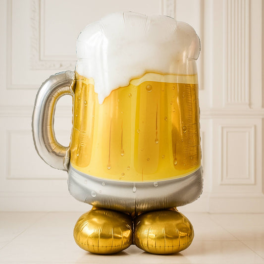 Inflatable beer mug balloon on a light background