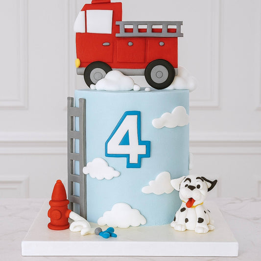 Children's birthday cake with a red fire truck, number 4, clouds, and a Dalmatian dog on a white background.