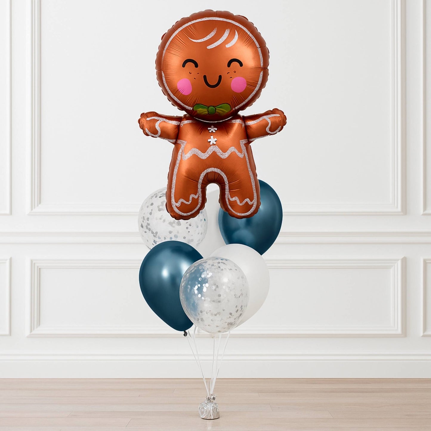 Gingerbread man balloon with blue and clear balloons on a white background