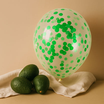 Balloon with green polka dots and avocados on a beige background