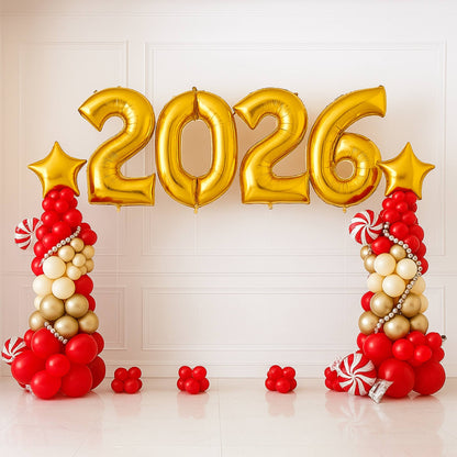 Gold '2026' balloons with red and gold candy decorations on a white background