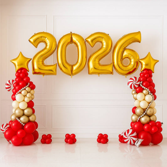 Gold '2026' balloons with red and gold candy decorations on a white background