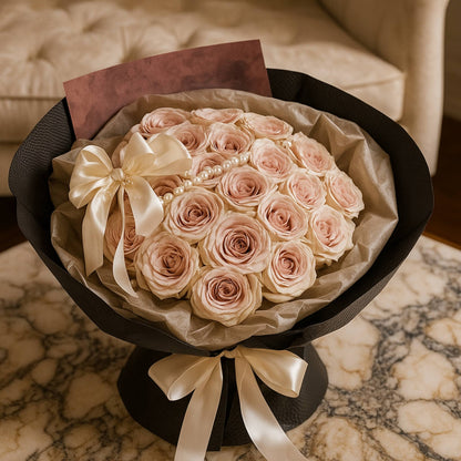 Bouquet of pink roses with a white bow on a marble surface