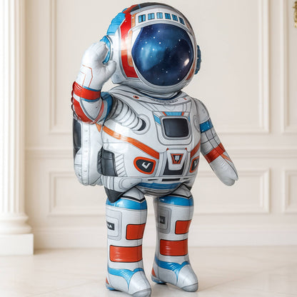 Astronaut-shaped balloon against a white wall