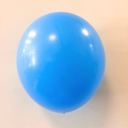 Blue balloon on a beige background