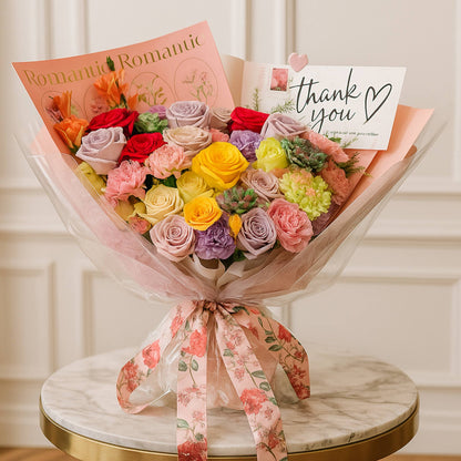 Bouquet of colorful flowers with a 'thank you' card on a marble surface.