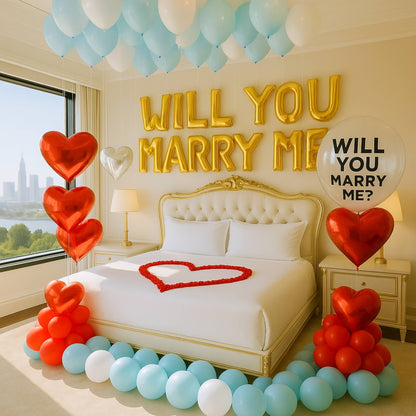 Decorated bedroom with 'WILL YOU MARRY ME?' balloons and heart-shaped arrangements.