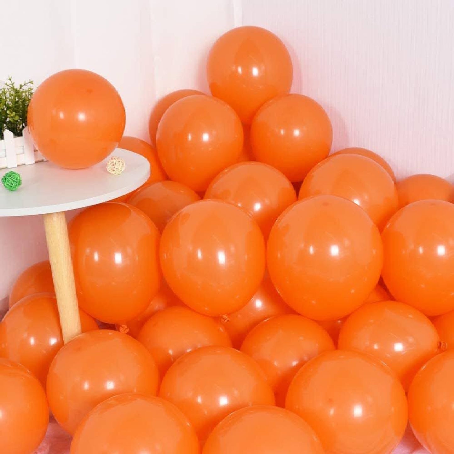 11 inch helium filled Orange latex balloon
