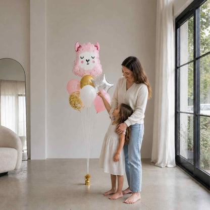 Woman and child holding balloons in a modern living room