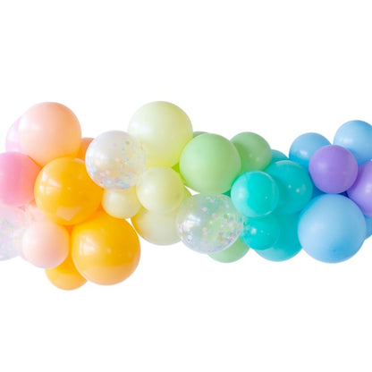 A garland of multicolored balloons in shades of pink, green, yellow, and blue, arranged in a line.
