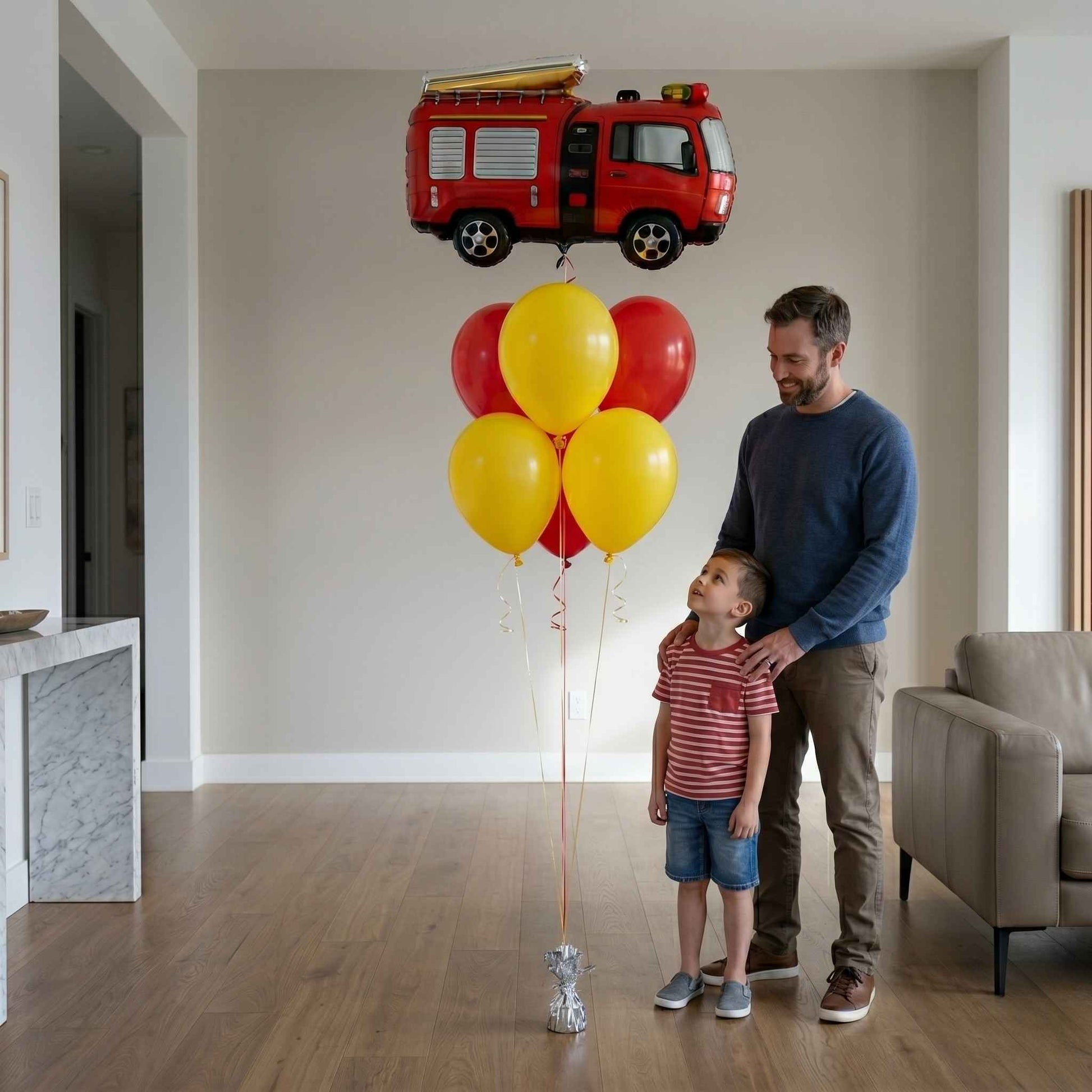 Father and son.They look at a balloon fire truck.