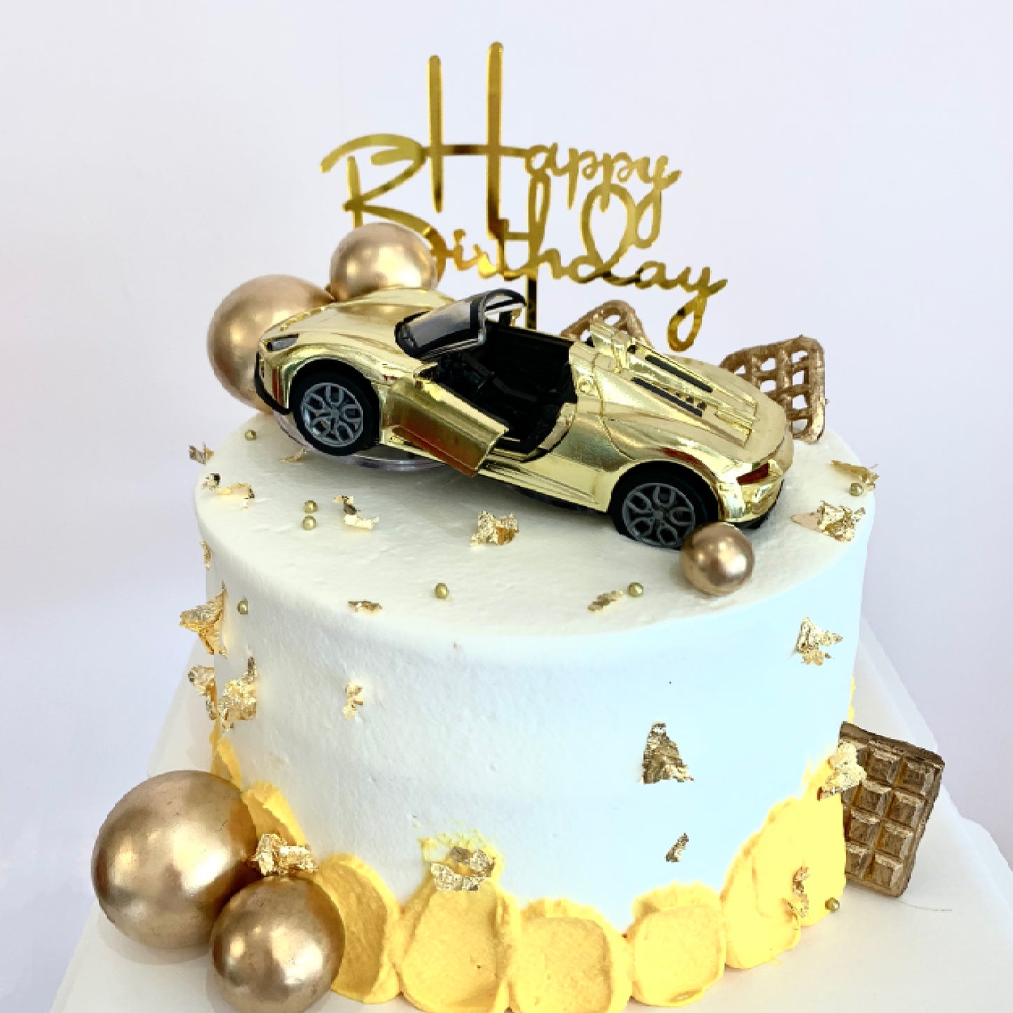 Super car gold birthday cake