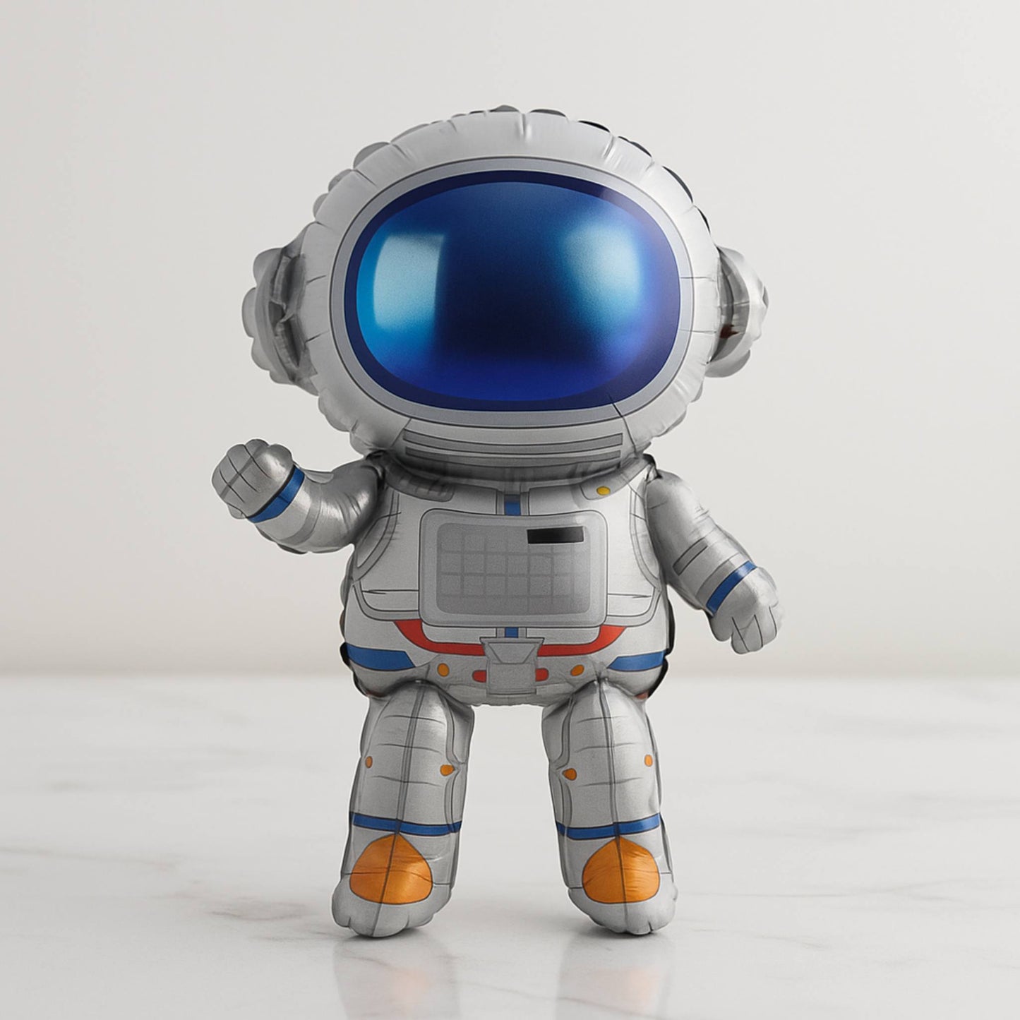Inflatable astronaut toy on a white background