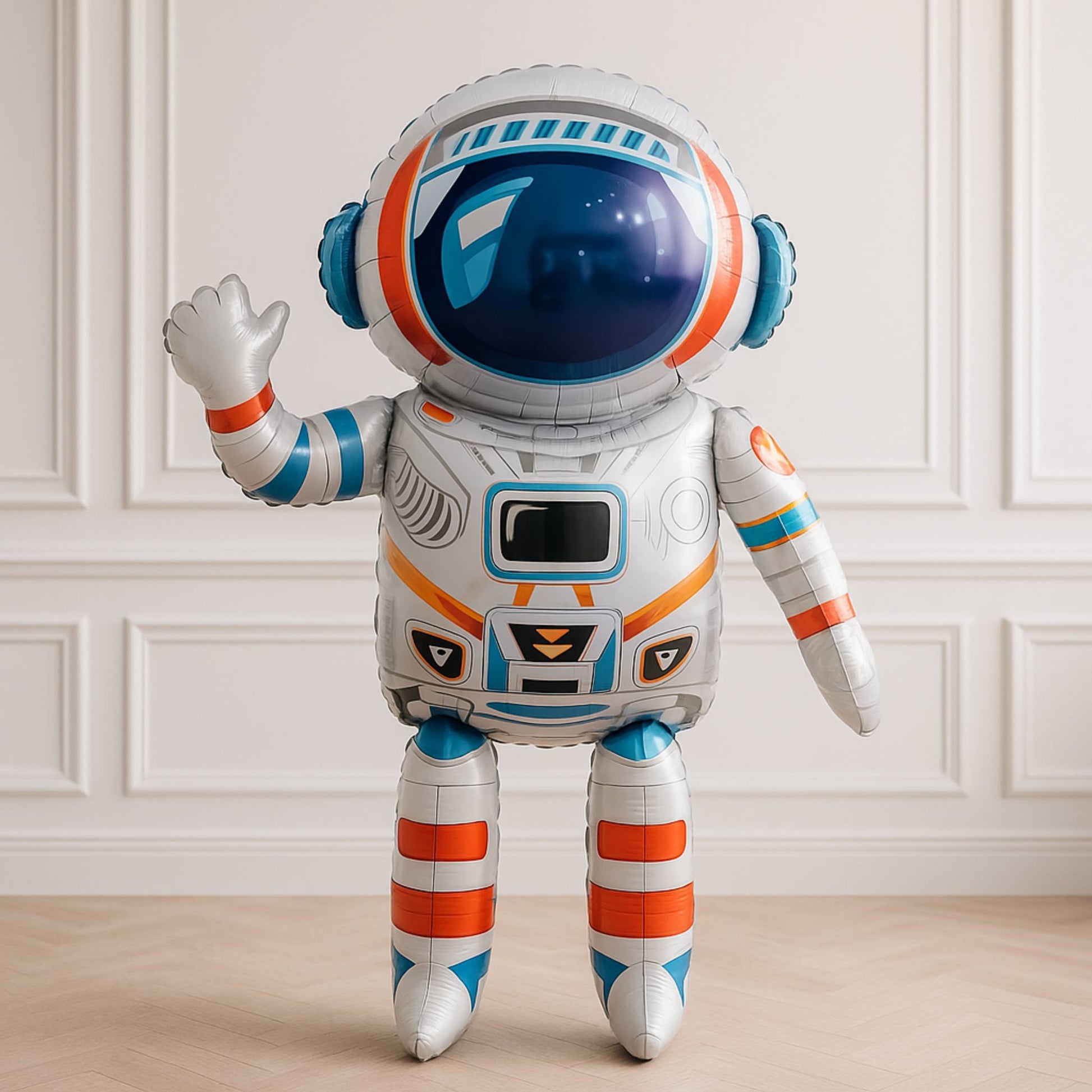 Balloon shaped like an astronaut against a white paneled wall.