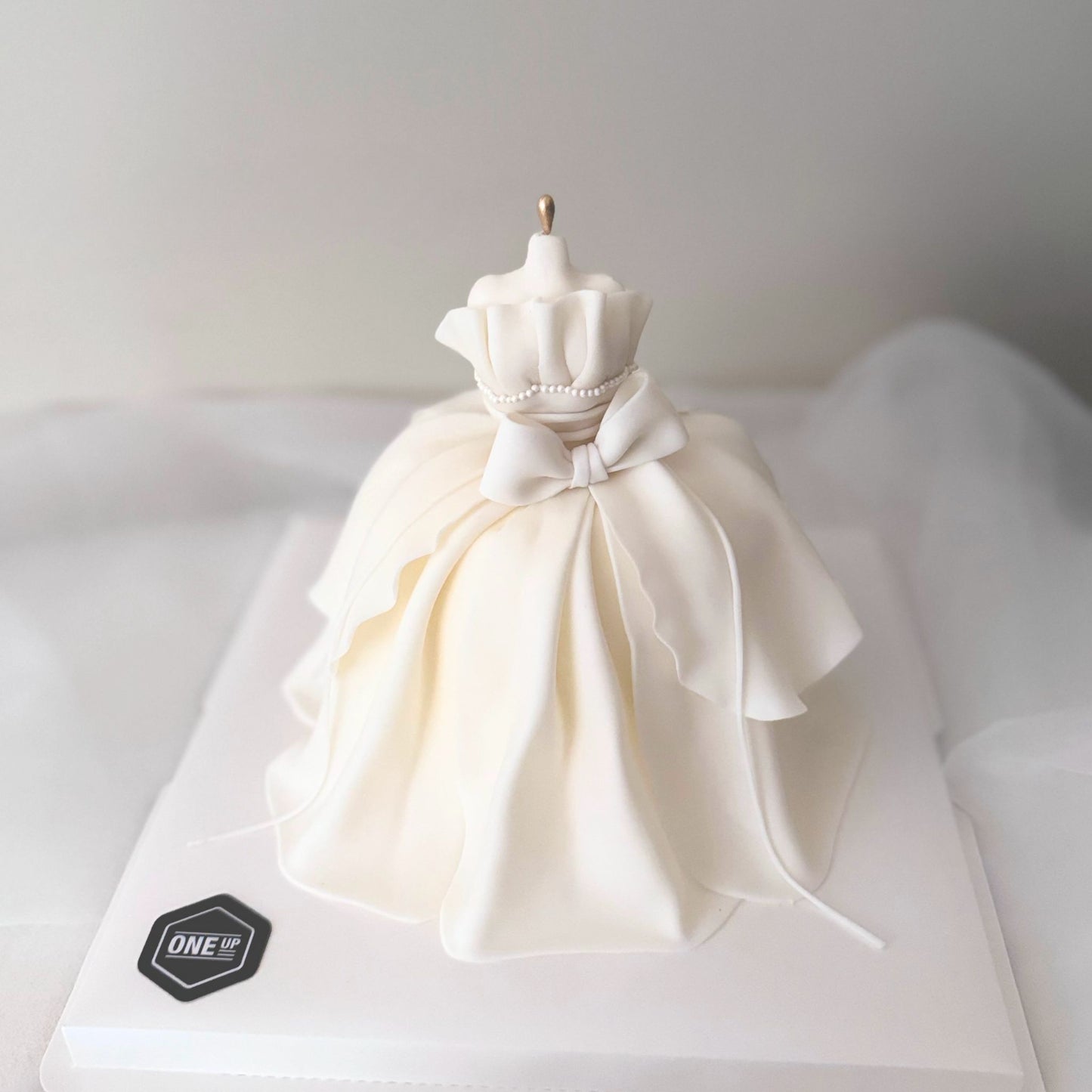 White Wedding Dress Cake