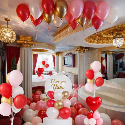 Decorative balloons with a 'I love you Yuki' sign in a room setting.