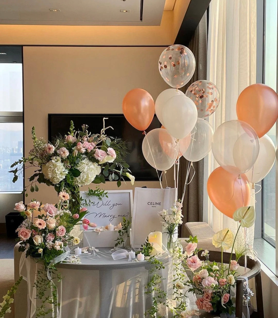 Rose gold soft colour theme proposal package - fresh floral and balloons